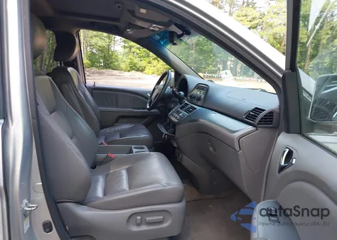 2010 Honda Odyssey Ex-L z USA, uszkodzony, nr VIN 5FNRL3H67AB027479